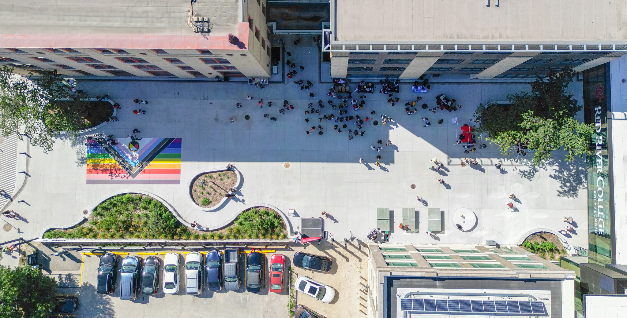 RRC Polytech's Exchange District Campus as seen from above, showcasing the Elgin Avenue promenade and Rainbow Walkway painted on the pavement.
