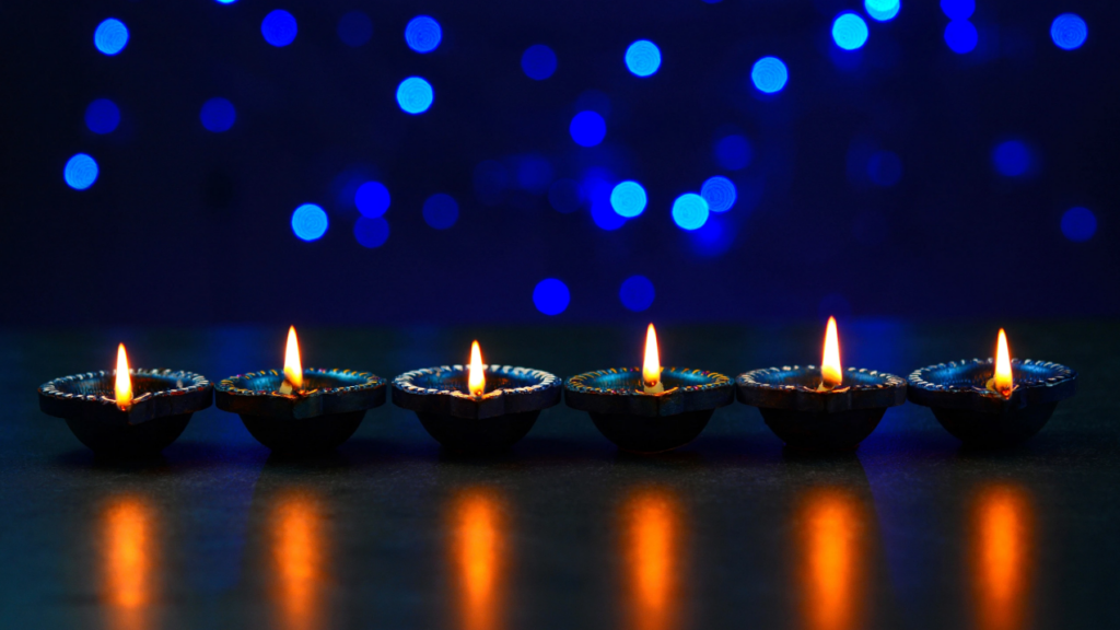 Six oil lamps (diyas) lit up