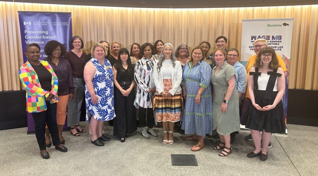 Group of stakeholders at federal and principal funding announcement for RRC Polytech's Shelter Support Worker micro-credential.