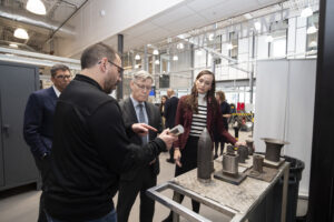 Visitors touring RRC Polytech's manufacturing lab.