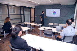 Man giving a presentation in a classroom