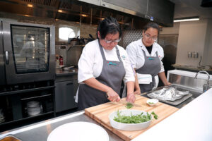 Culinary students preparing food