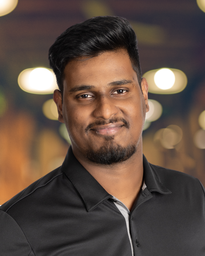 Headshot of Abi Varghese