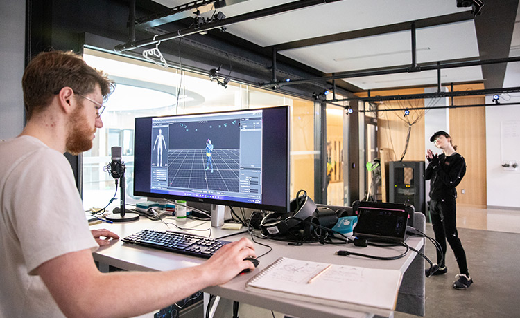 Two students in a motion capture studio