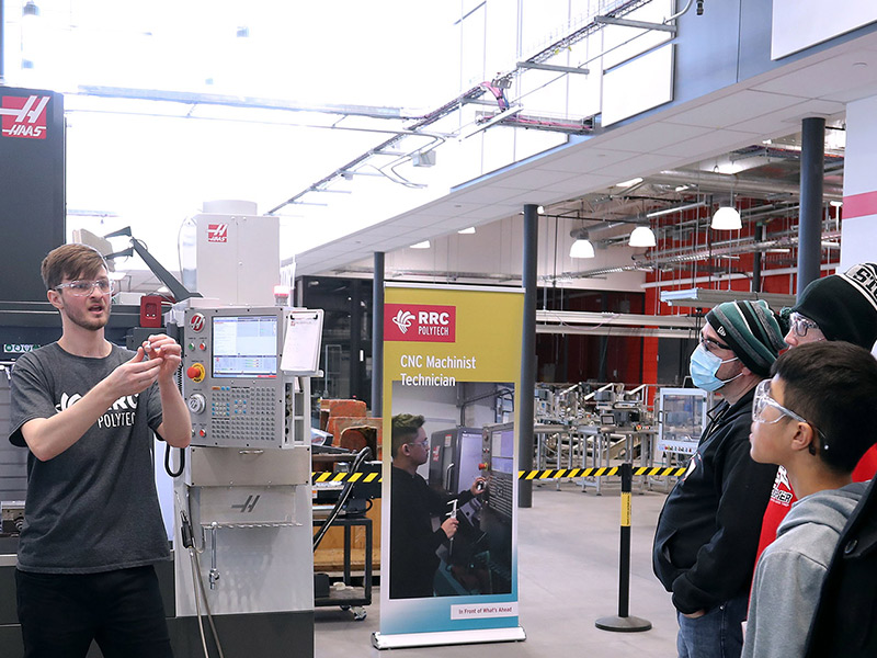 Instructor taking photo of students at the Haas bootcamp